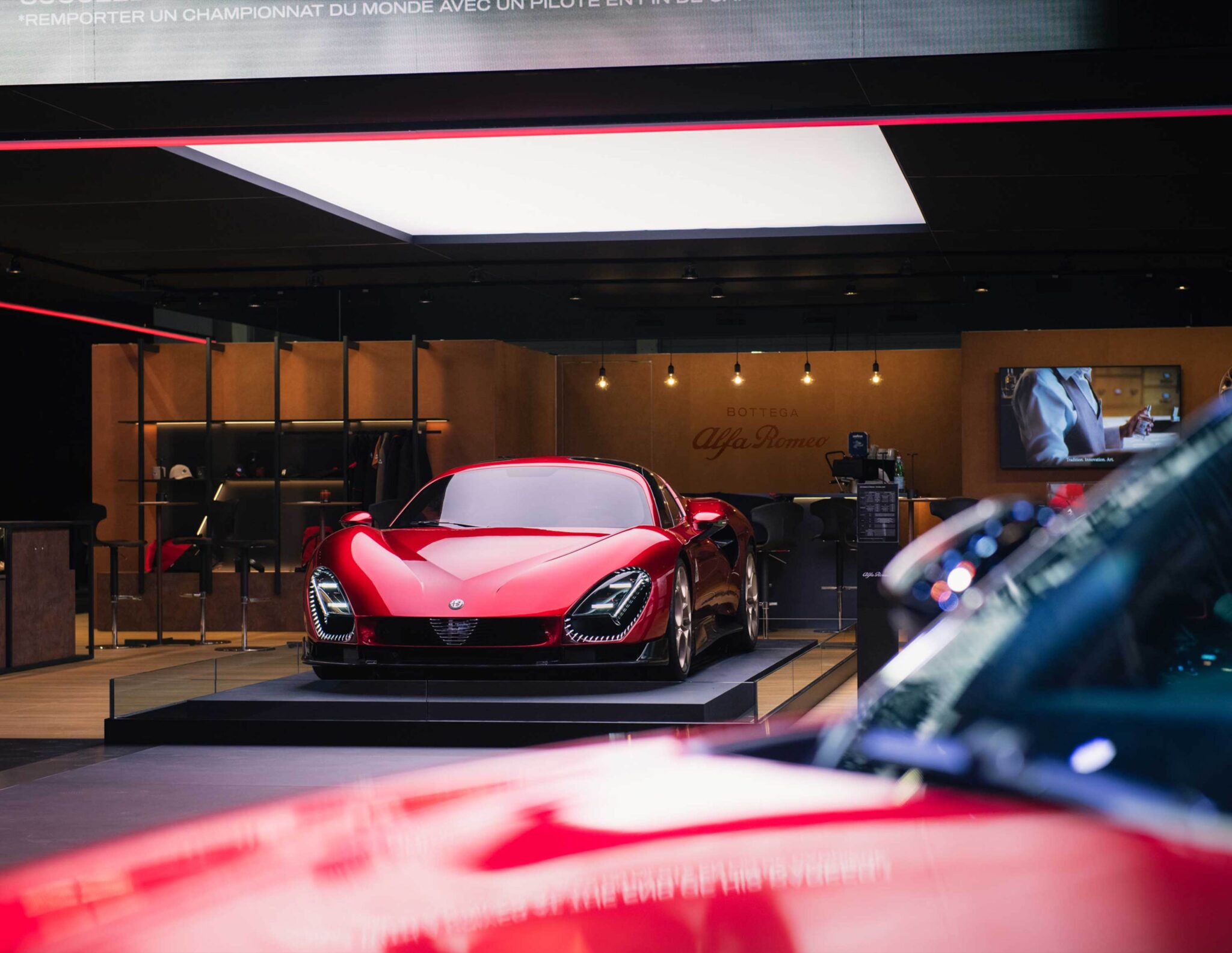 Red Alfa Romeo 33 Stradale on display at the 2024 motor show
