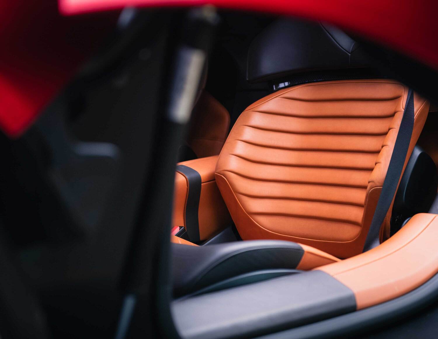 Close-up of the orange leather seat in the Alfa Romeo 33 Stradale