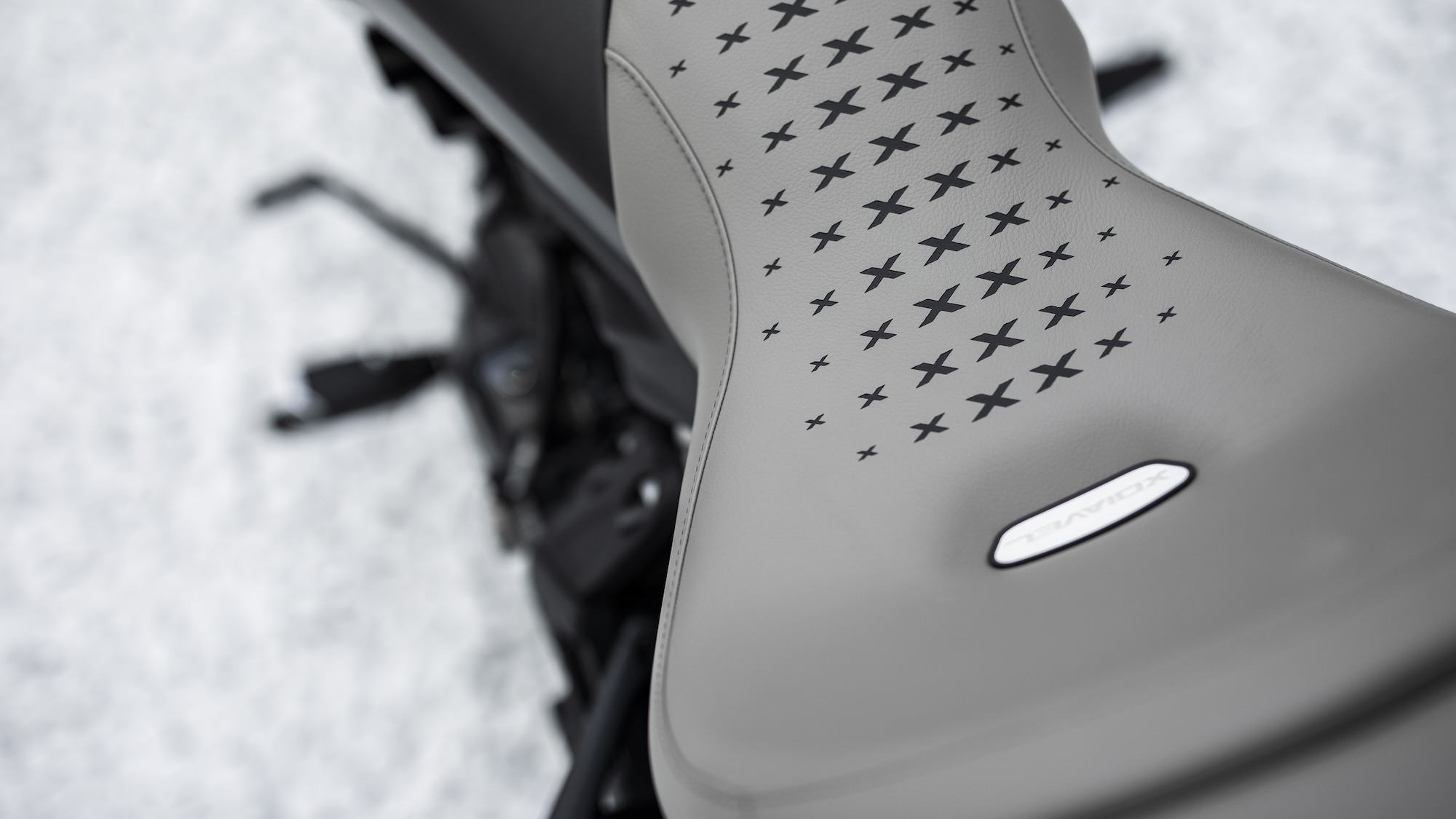 Top view of the Ducati XDiavel seat in grey leather with star-pattern stitching