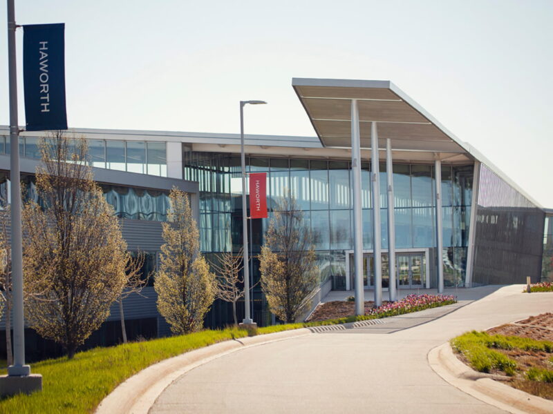 Exterior of the Haworth corporate building with modern architecture and landscaped entrance