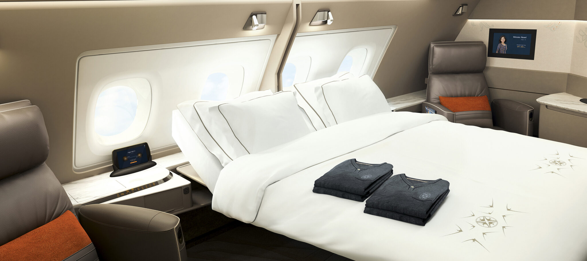 First class suite bed aboard the Singapore Airlines A380, upholstered in cream leather