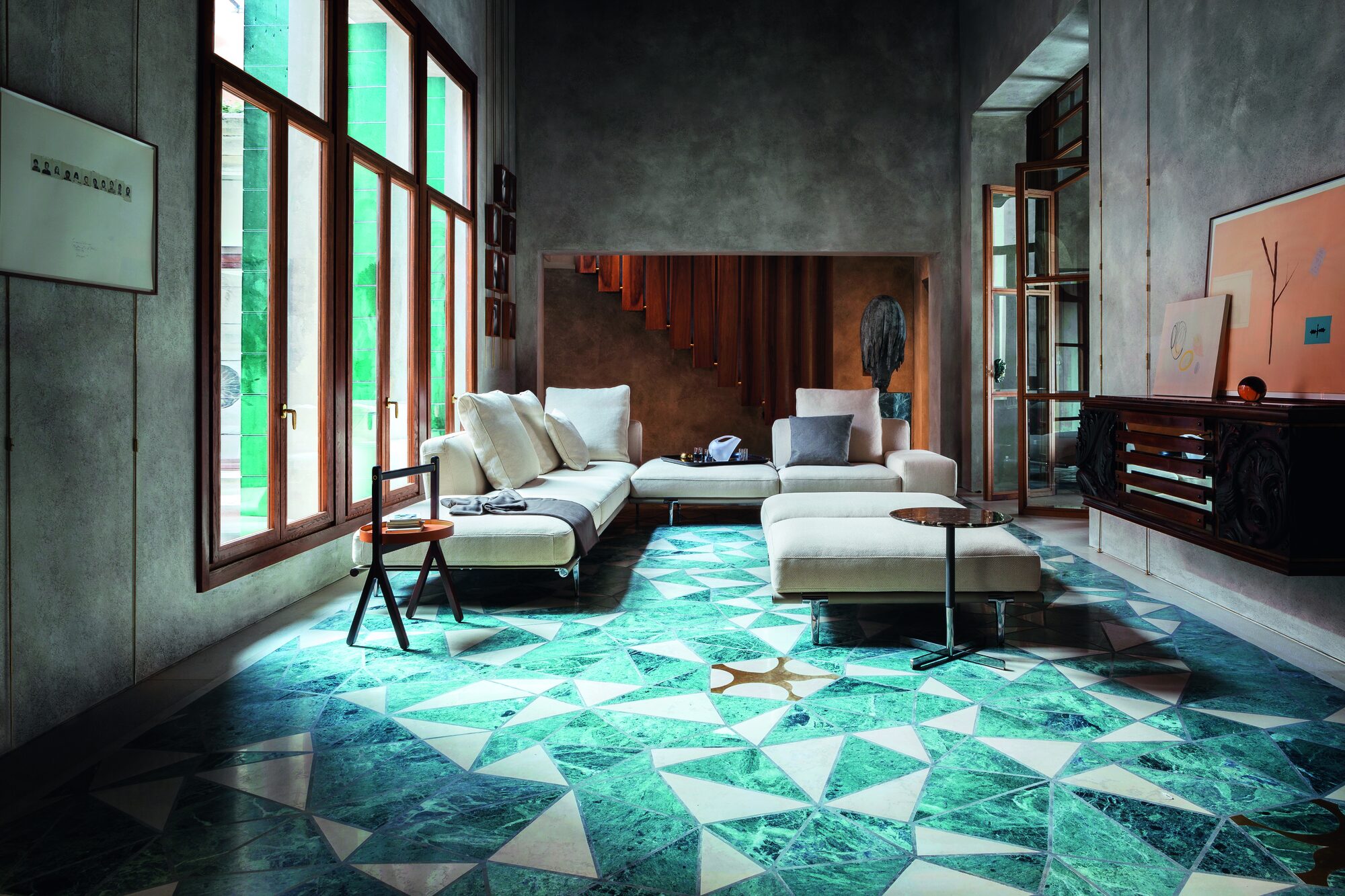 Poltrona Frau design lounge with geometric green marble flooring