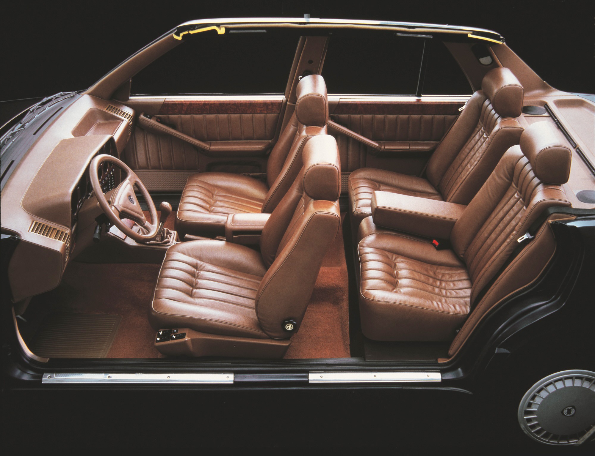 Vintage brown leather car interior, early Poltrona Frau In Motion automotive work