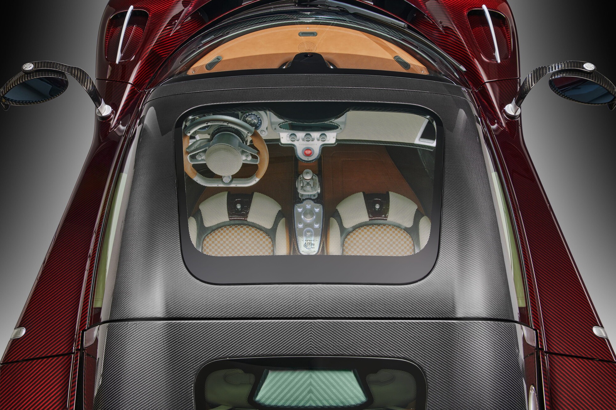 Overhead view of the Pagani Utopia Roadster with carbon fibre bodywork and visible interior
